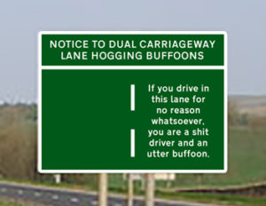 Close Up of Lane Hogging Buffoon Sign